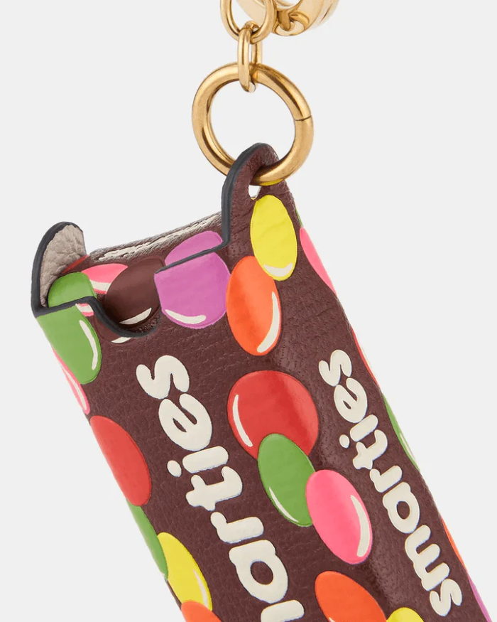 Anya Hindmarch Smarties Charm Grainy Capra in Mahogany