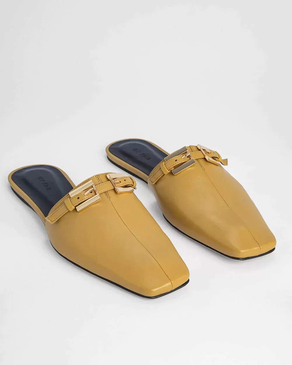 By Far Rado Buckled Creased Glossed-Leather Slippers In Ochre