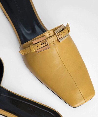 By Far Rado Buckled Creased Glossed-Leather Slippers In Ochre