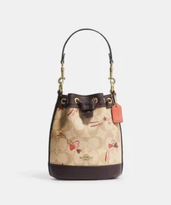 Coach Mini Dempsey Bucket Bag In Signature Canvas With Heart And Star Print