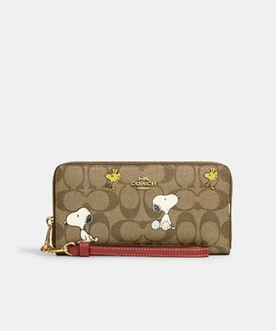 Coach X Peanuts Long Zip Around Wallet In Signature Canvas With Snoopy Woodstock Print