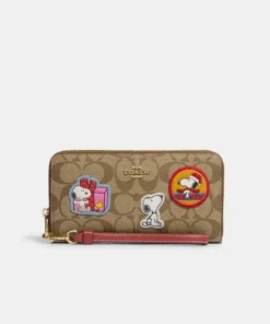 Coach X Peanuts Long Zip Around Wallet In Signature Canvas With Patches