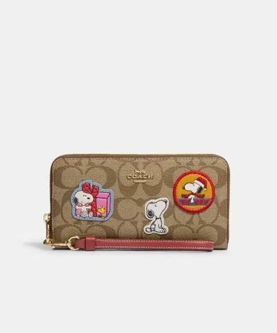 Coach X Peanuts Long Zip Around Wallet In Signature Canvas With Patches